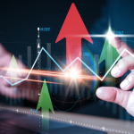 Stock market chart with rising trend lines and arrow in upward direction.